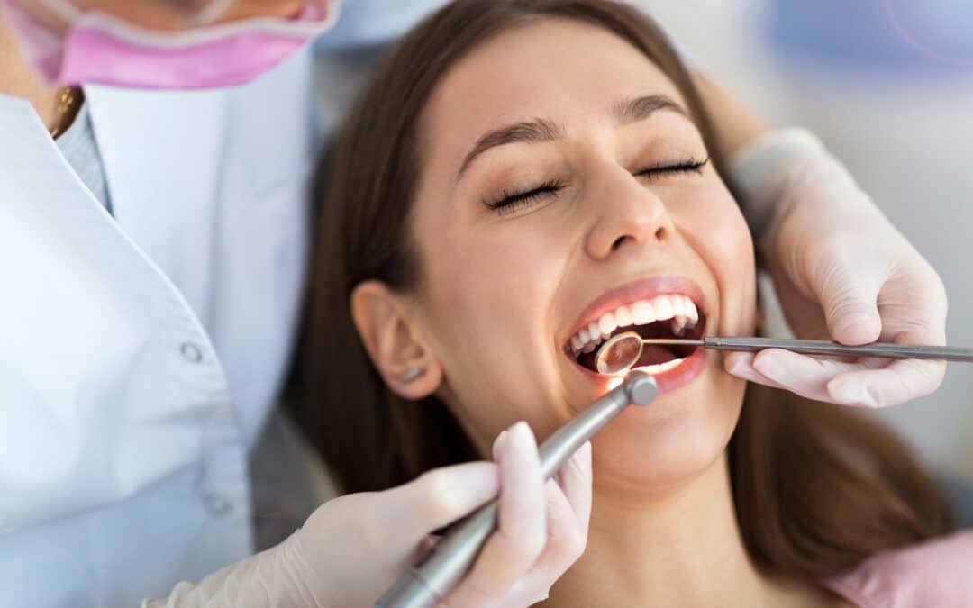 woman at the dentist; holistic dentistry concept